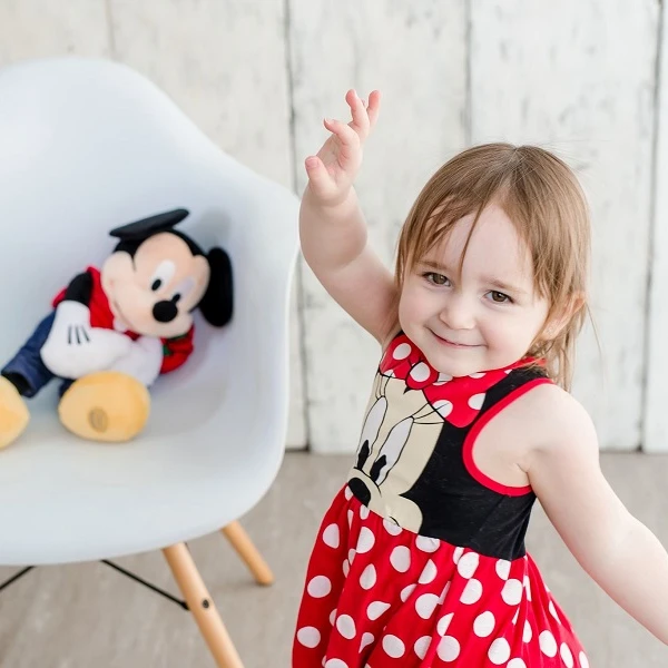 little girl named camille with mickey mouse dress