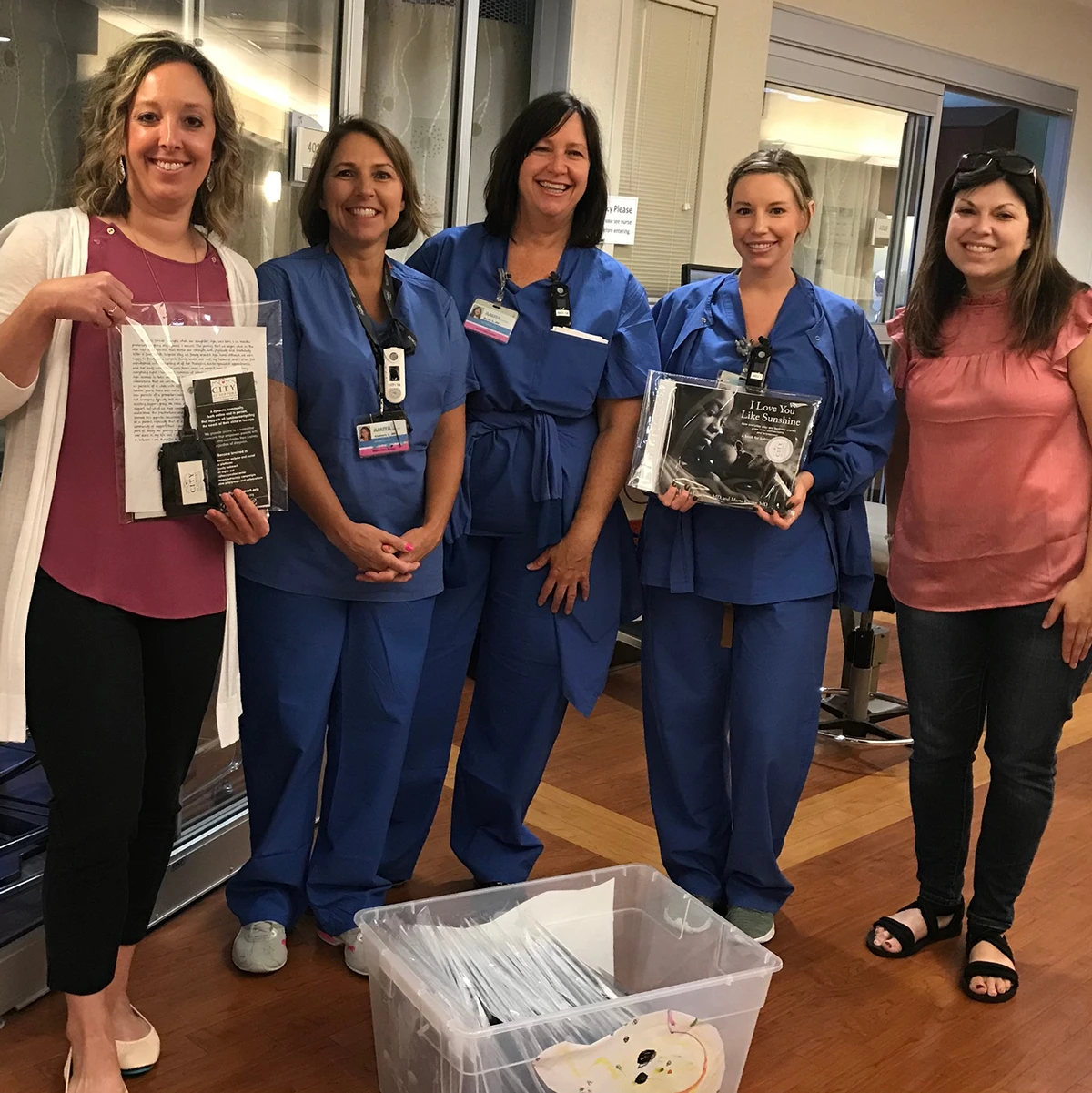 NICU nurses holding welcome bags