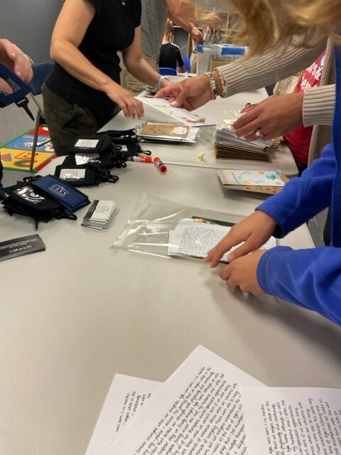 volunteers assembling nicu kits